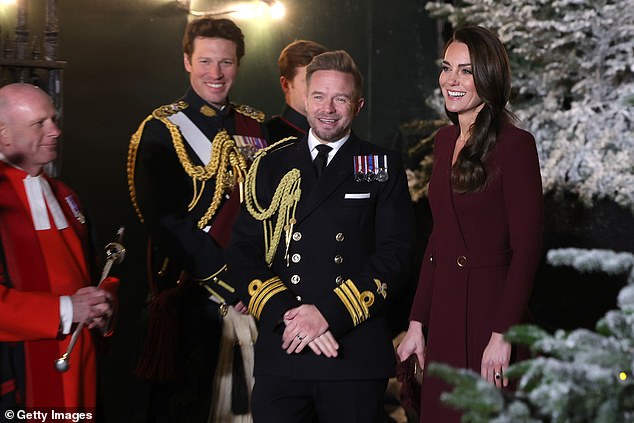 Lieutenant Commander Robert Dixon with The Princess of Wales at the Christmas Carol Service in Westminster Abbey in 2022