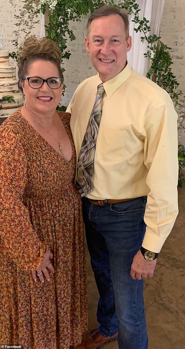 The abuser is pictured here with his wife, Elizabeth Raymond. He is scheduled to be sentenced on October 23 and his bail has been set at $100,000