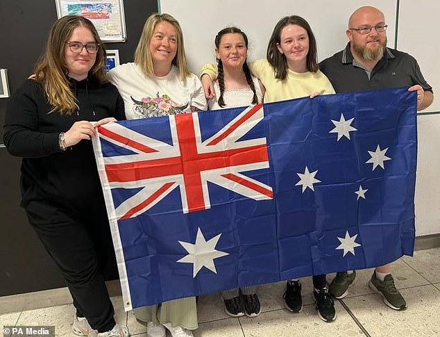 In June this year, Darren, his wife and their three daughters (pictured together) packed up their belongings from their three-bedroom home in Grangemouth and moved to Perth