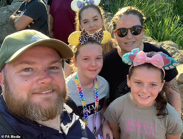 Darren said his family (pictured together) are settling in well to work and school in Australia