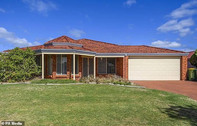 While they wait for the sale of their Scottish home to close, the family rents a four-bedroom house in Perth (pictured) with a large back garden and theatre room. It is also close to the beach.