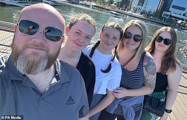 Darren described the process of obtaining visas for the family (pictured), enrolling his daughters in new schools and selling their property in Scotland as 'stressful'