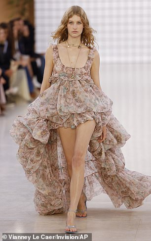 The models took to the catwalk as they gave a very long show in a stunning floral and ruffled dress