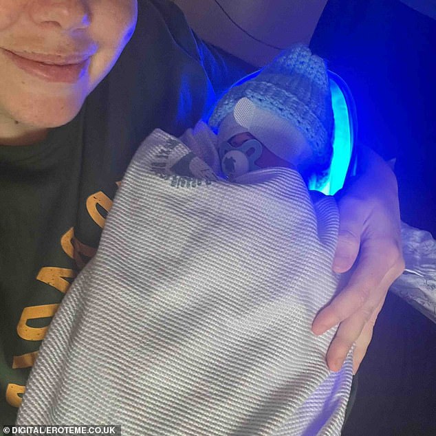 In one photo, Scarlett is seen lying on a hospital bed with her son Jude in her arms