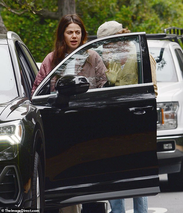 The actor was seen opening the car door for Molly