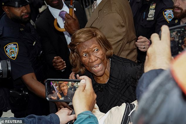 Dukes, a former NAACP leader, shouted back at protesters who drowned her out as she tried to speak in defense of Adams outside Gracie Mansion.