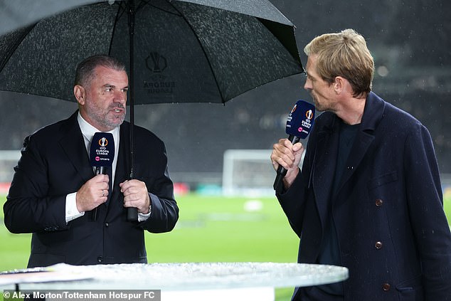 There was a lot of rain in the air as Peter Crouch (right) interviewed Ange Postecoglou (left)