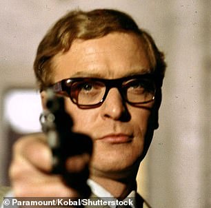 Michael Caine wears thick black glasses as he stars in Funeral in Berlin