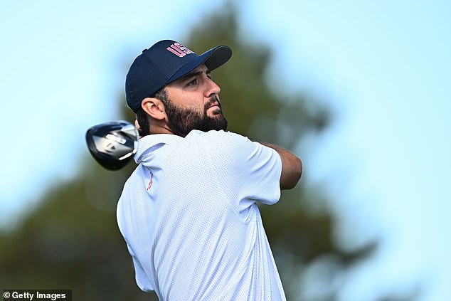 U.S. team's Scheffler plays his shot from the ninth tee during Thursday's four-ball matches on day one of the 2024 Presidents Cup at Royal Montreal Golf Club