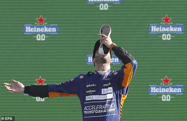 The 35-year-old Australian, pictured drinking champagne from his shoe as he stood on the Monza podium in 2021, has won eight Grand Prix during his Formula 1 career