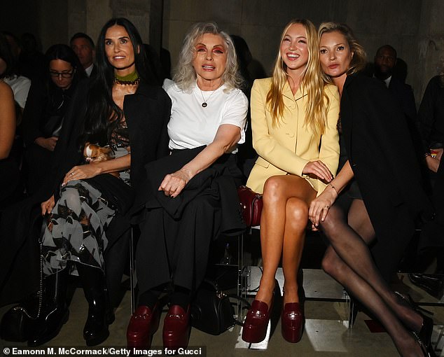 Harry previously sat front row at Gucci's Cruise 2025 runway presentation at London's Tate Modern on May 13 alongside Demi Moore (L), Lila Moss (2-R) and her famous mother Kate Moss (R)