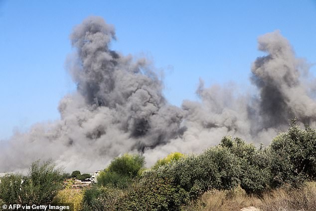 Smoke rises over the site of an Israeli airstrike that targeted the southern Lebanese village of Siddiqin today