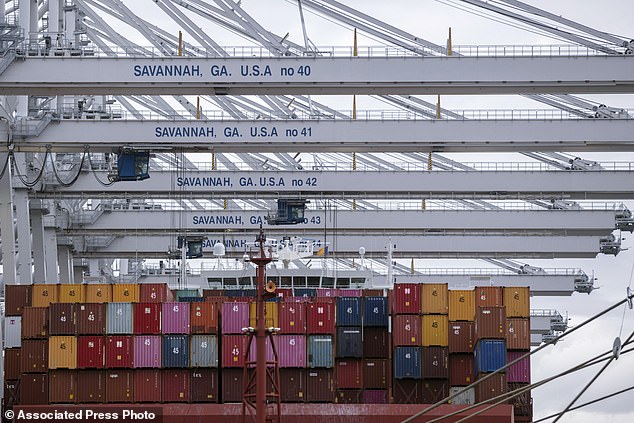 The move would also disrupt supply chains that have only just recovered from the pandemic, further increasing inflation and the cost of living. A ship is seen loaded with containers at the Georgia Ports Authority's Savannah Garden City Terminal in Savannah, Georgia