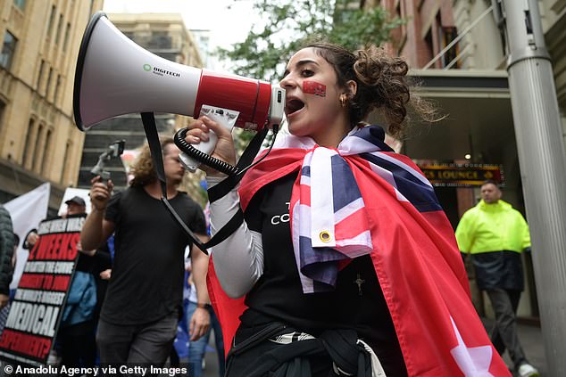 Human rights groups are concerned that the proposed legislation could restrict freedom of expression (a protester is pictured in Sydney in November 2021)