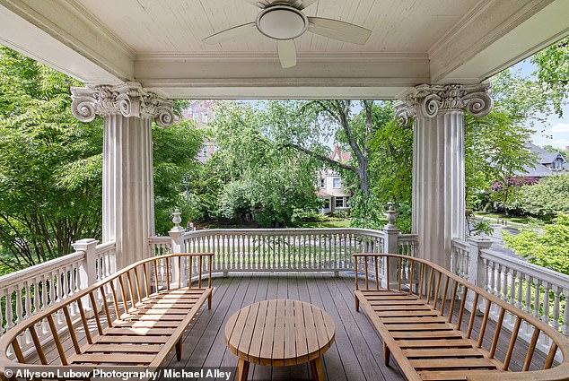 Built in 1910 and meticulously restored, the beautiful estate has eight bedrooms, six bathrooms, a two-story veranda and cinematic pilasters and columns.