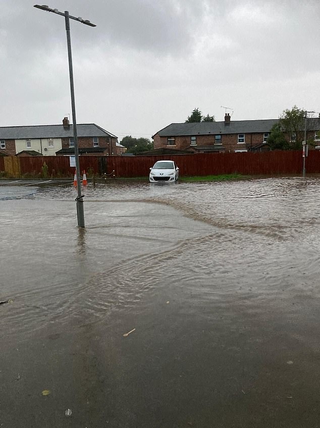 Time for the boots! One unfortunate soul may have needed a raft if they wanted to get to their car with dry feet