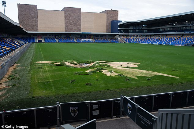 Heavy rain on Sunday evening led to a massive sinkhole at AFC Wimbledon's Plow Lane Stadium