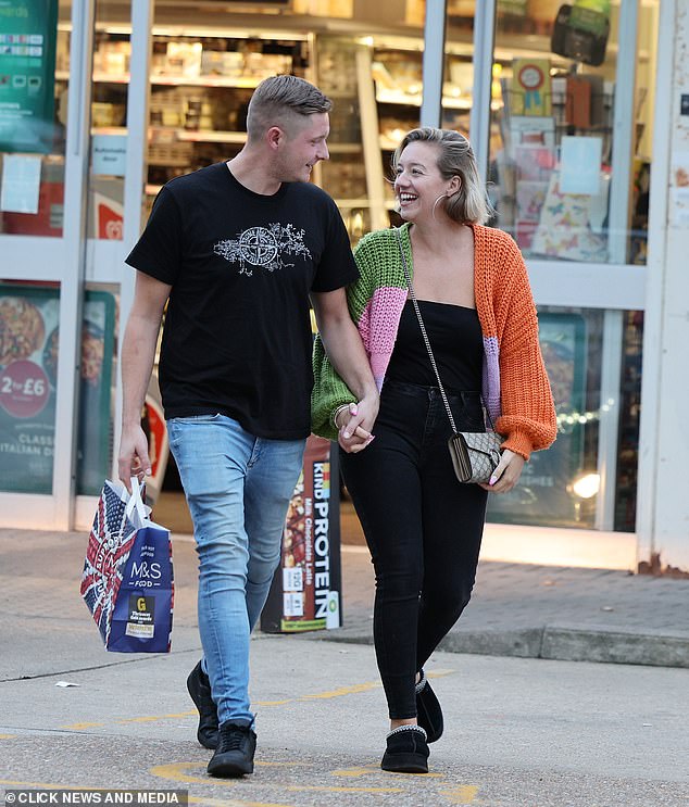 The mother-of-two, 33, was pictured holding hands and gazing adoringly at her new boyfriend Will as they walked into a petrol station in Bexleyheath, London.