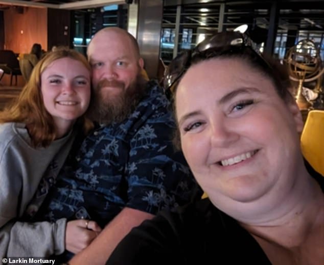 Barrett, pictured with her mother Elizabeth and her father Adam