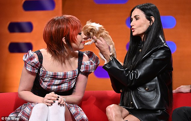 She formed an immediate bond with Demi Moore's dog micro-chihuahua Pilaf - who, like Demi, was making her Graham Norton debut - and accepted a kiss from her.