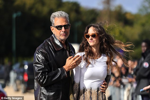 The couple looked effortlessly stylish as they posed for photos together outside the event, which showcased the Spring/Summer 2025 collection