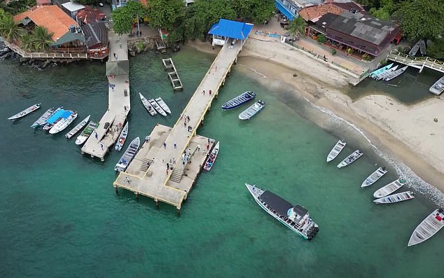 Capurgana (above) is one of the last major stops before these travelers enter Central America in search of a new life further north, invariably in the US.