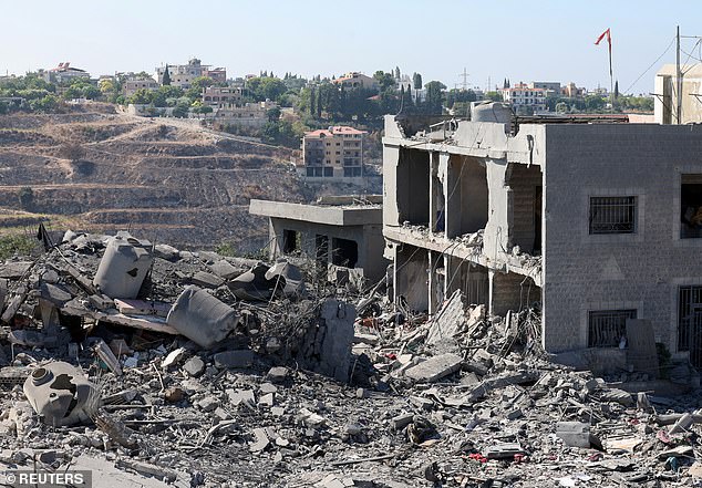 An image shows damage at the site of the Israeli attack in Saksakiyeh, southern Lebanon, September 27, 2024