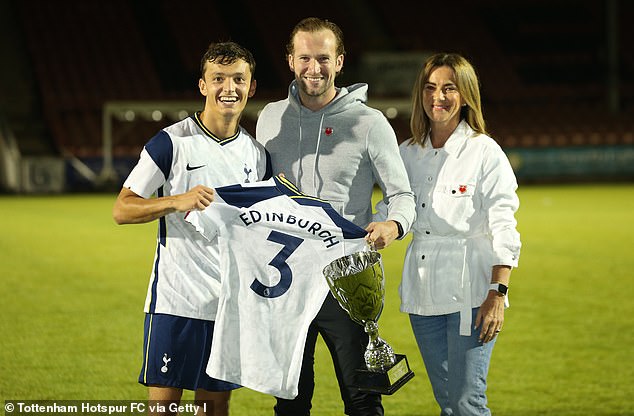 Edinburgh's son Charlie (centre) helped set up the Justin Edinburgh 3 Foundation, which has directly saved the lives of two people through the many defibrillators it donated