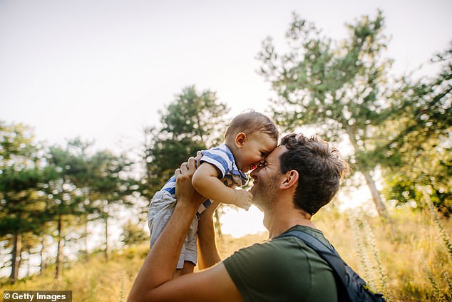 Scientists believe that the smell of a parent's own child activates parts of the brain associated with pleasure and reward, promoting a loving relationship (stock image)