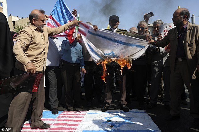 'Israel is being destroyed. Lebanon has won,” Iranian protesters chanted as they burned Israeli and American flags this afternoon