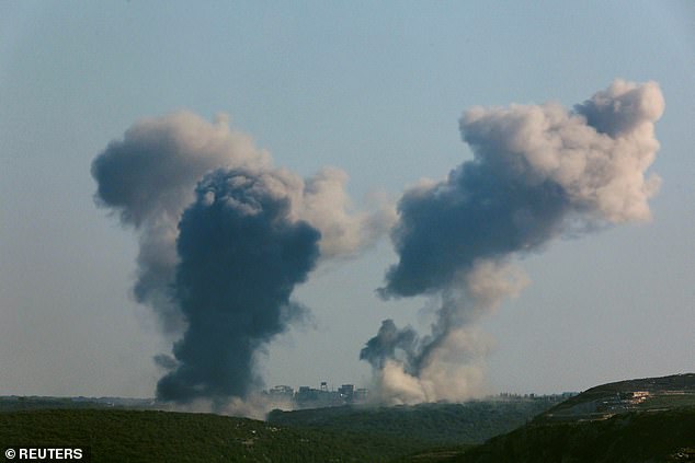 Smoke rises over southern Lebanon after an Israeli attack, amid ongoing cross-border hostilities between Hezbollah and Israeli forces, as seen from Tyre, Lebanon, September 27, 2024