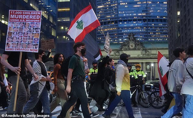 Anti-war activists gather outside the hotel where Israeli Prime Minister Netanyahu - who is in town for the annual sessions of the UN General Assembly - is staying