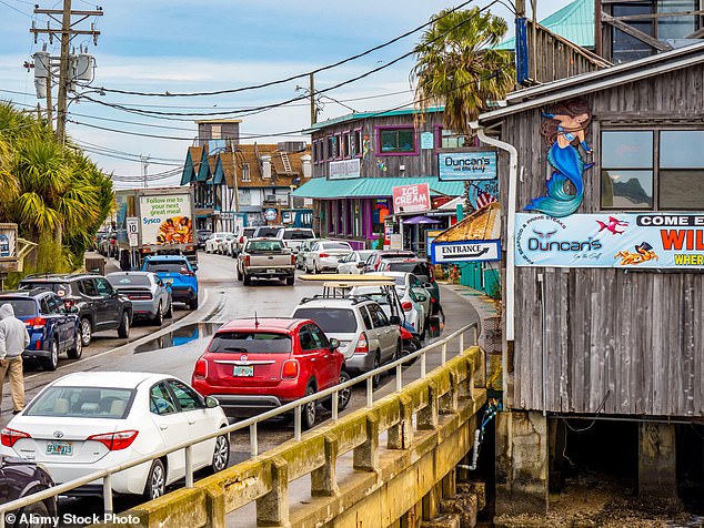 The popular tourist attraction, seen here before the hurricane, was hit by the storm on Thursday evening as it hit the Gulf of Mexico