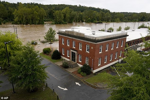 In North Carolina, four people were seriously injured and countless others suffered minor injuries after a tornado touched down in Rocky Mount. The banks of the Swannanoa River in Asheville, NC can be seen here