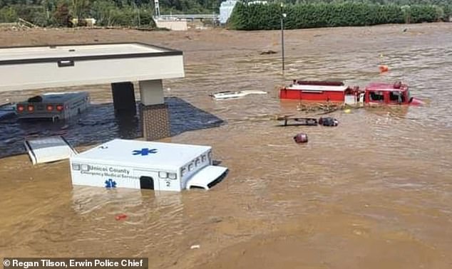 Several ambulances, cruisers and other emergency vehicles flooded the area as floodwaters inundated the area