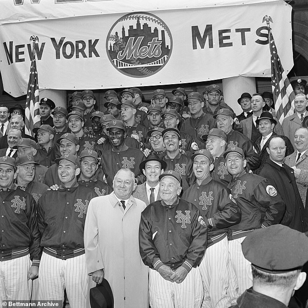 The expansion 1962 Mets are pictured behind manager Casey Stengel and GM George Weiss