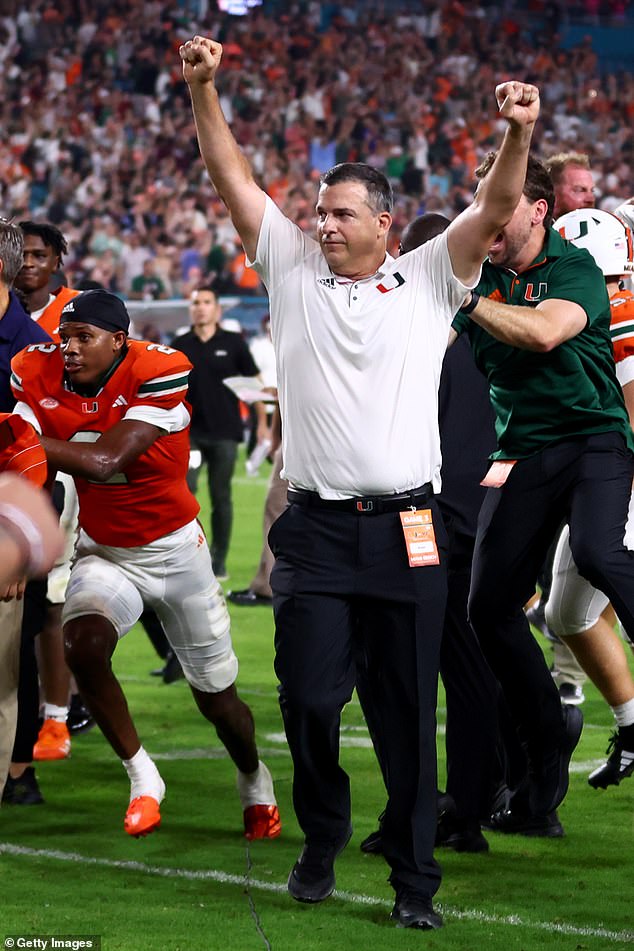 Miami Hurricanes head coach Mario Cristobal celebrates after beating Virginia Tech