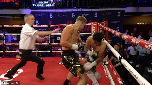 The 22-year-old was knocked out in the first round at York Hall by Tommy Sams (right).