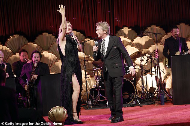 At the event, Hawn celebrated the 20th anniversary of her foundation's mental health program MindUP during the festivities which took place at Ron Burkle's Greenacres (Kate pictured with Martin Short)