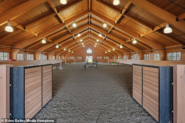 One sees the enormous indoor arena, with beautiful wooden ceilings