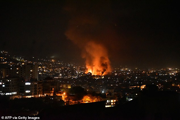 Smoke rises from the site of an Israeli airstrike that targeted a neighborhood in Beirut's southern suburbs early on September 28, 2024. The Israeli army said on September 28 that it had killed the commander of Hezbollah's missile unit in southern Lebanon in an airstrike, along with his deputy and several other leaders of the Iran-backed movement