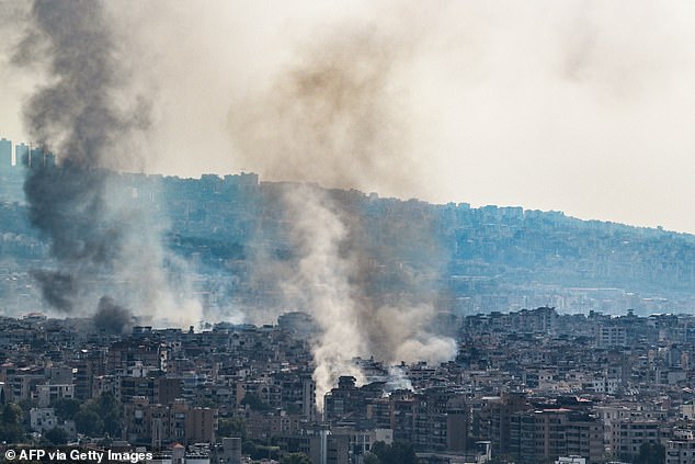 Smoke rises over the southern outskirts of Beirut during Israeli attacks on September 28, 2024. Lebanon's Iran-backed Hezbollah group confirmed on September 28 that its leader Hassan Nasrallah had been killed, after Israel said it "eliminated" him a day earlier in an attack on South Beirut