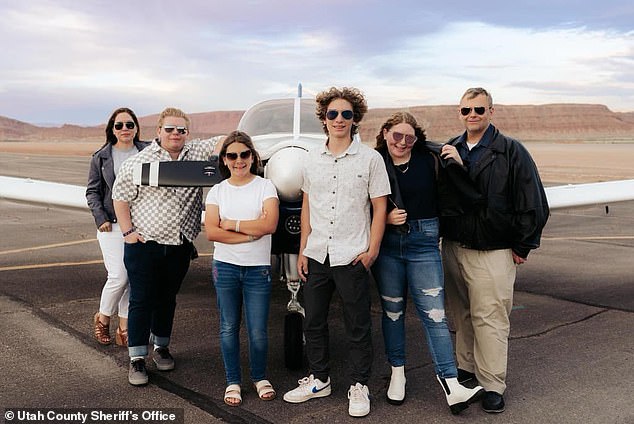 Michael Hyrum Cox (far right), 43, pictured with his family before he died in a plane crash