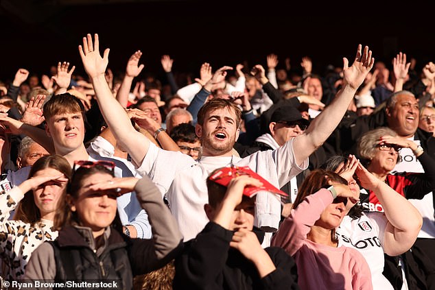 Happy Fulham supporters singing during Saturday's away win at Nottingham