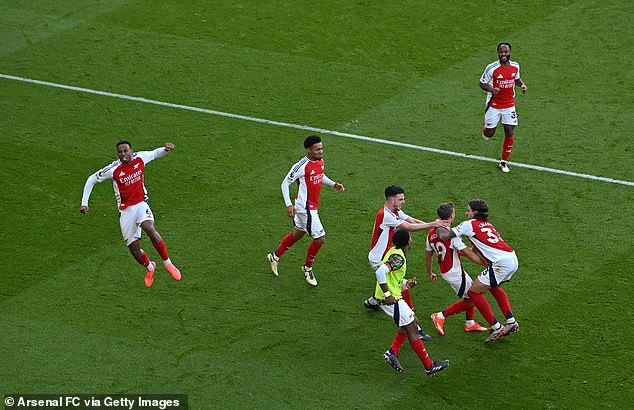 Trossard was mobbed by his Arsenal teammates after restoring their lead in extra time