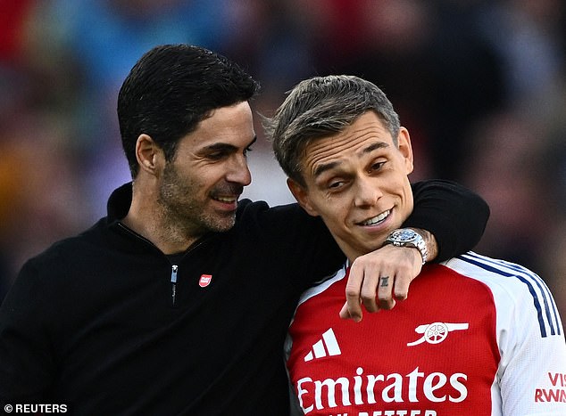 Arsenal manager Mikel Arteta (left) celebrated with Trossard after Saturday's match