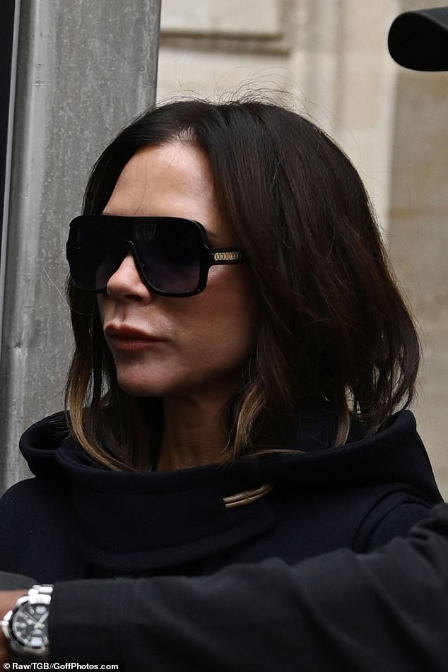 Earlier in the day, Posh kept a low profile in a black jacket and trendy sunglasses