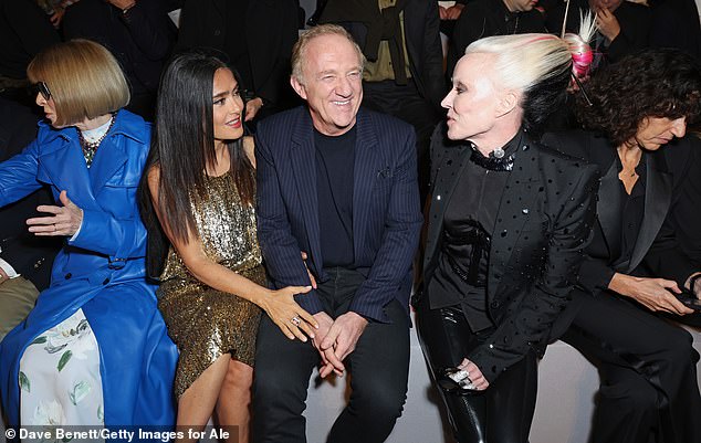 Frida's favorite - who also attended the event with husband Francois-Henri Pinault (R) - beamed happily as he posed next to fashion legend Anna Wintour (L)