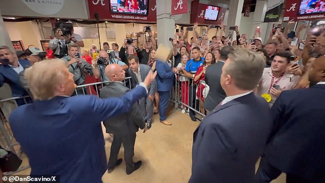 The ex-president's secret service was close by, watching the crowd's every move