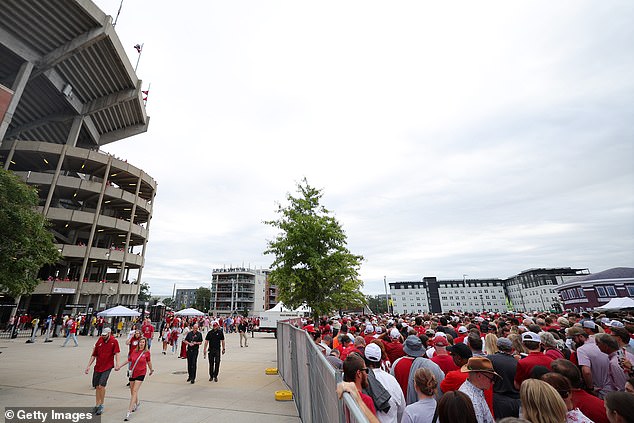 Fans wait outside Bryant-Denny Stadium as security is increased for the game between the Alabama Crimson Tide and the Georgia Bulldogs on September 28, 2024 in Tuscaloosa, Alabama